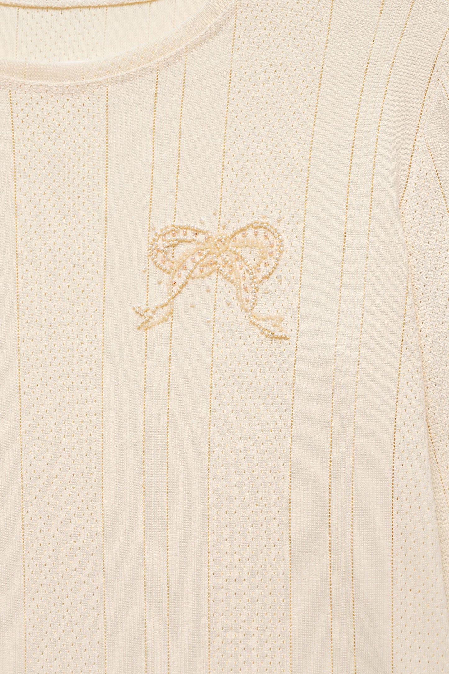 TEXTURED LONG SLEEVE TOP IN MILK