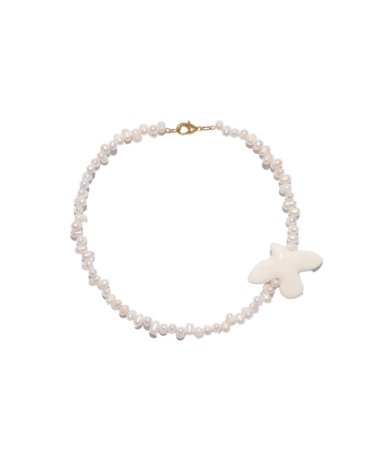 NECKLACE MYRNI WITH IRREGULAR PEARLS AND A BIRD